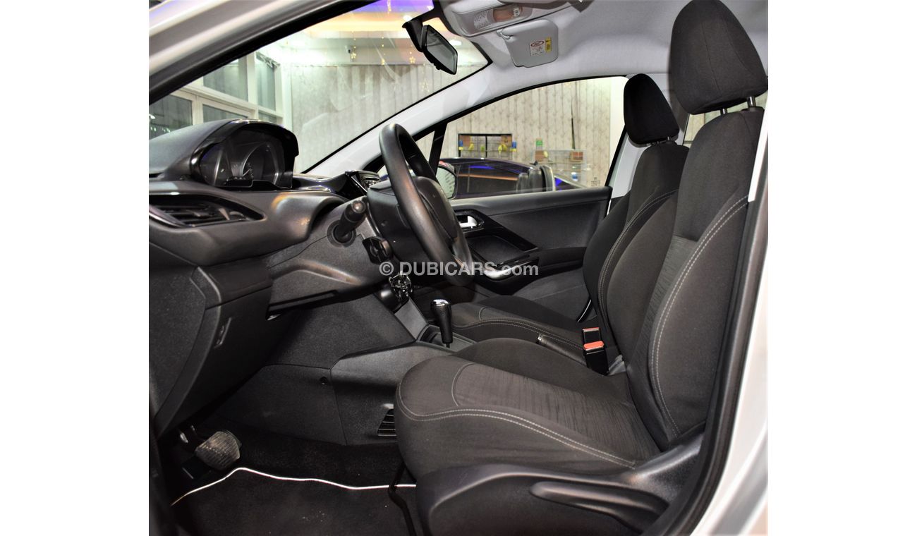 Peugeot 208 LOW MILEAGE! EXCELLENT DEAL for our Peugeot 208 2016 Model in White Color GCC Specs