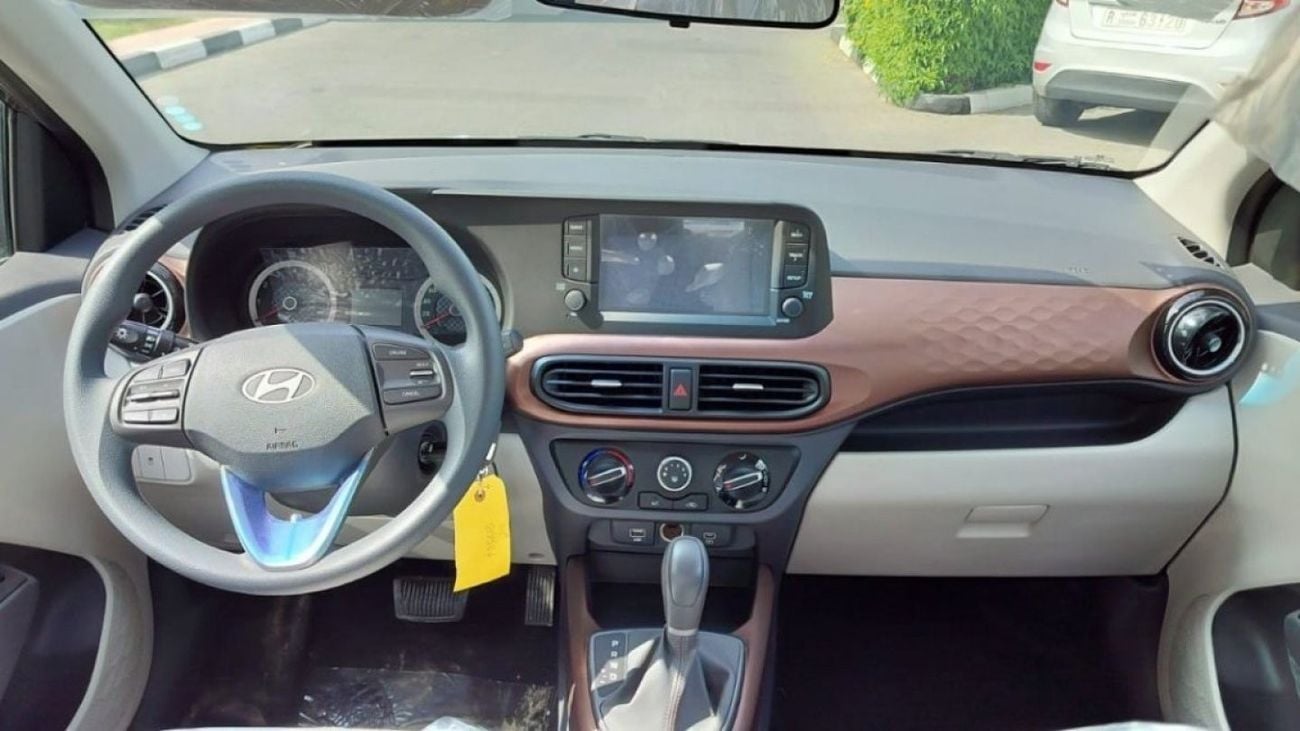 Hyundai Grand i10 1.2L Petrol Engine Sedan | Gray and Silver | 2024