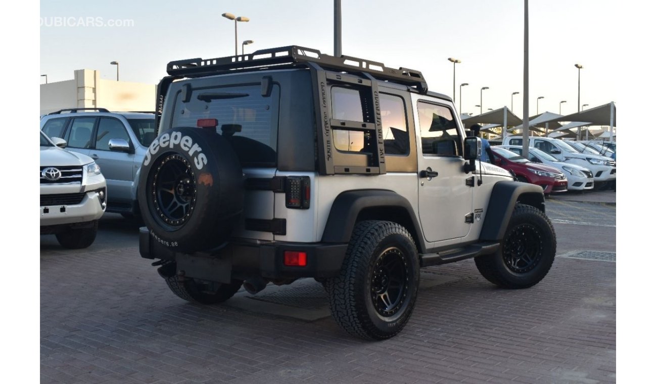 Jeep Wrangler SPORT 2 DOORS | AUTOMATIC TRANSMISSION | GCC | SPECTACULAR CONDITION |