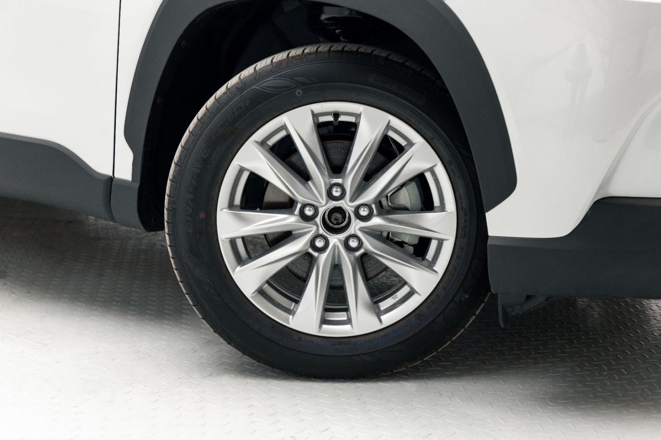 Toyota Corolla Cross Elite 2.0L - Hybrid - White Inside Black | Export Only