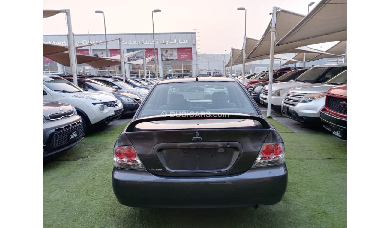 ميتسوبيشي لانسر خليجي 2009 تكييف باورأوتوماتيك سنتر لوك جناح خلفى بحالة ممتازة جدا لاتحتاج الي أى مصاريف