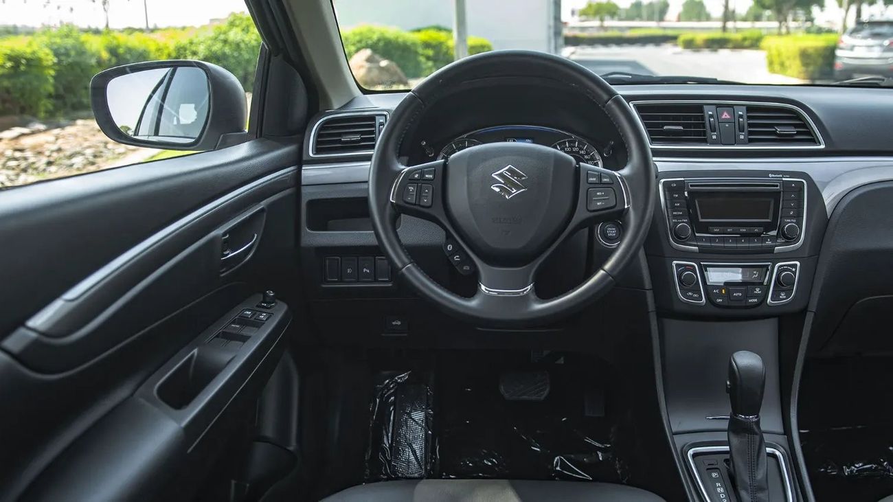 Suzuki Ciaz ALLOY RIMS, PUSH START + REAR VIEW CAMERA, SMALL DISPLAY IN CETRE VIEW MIRROR, CRUISE CONTROL