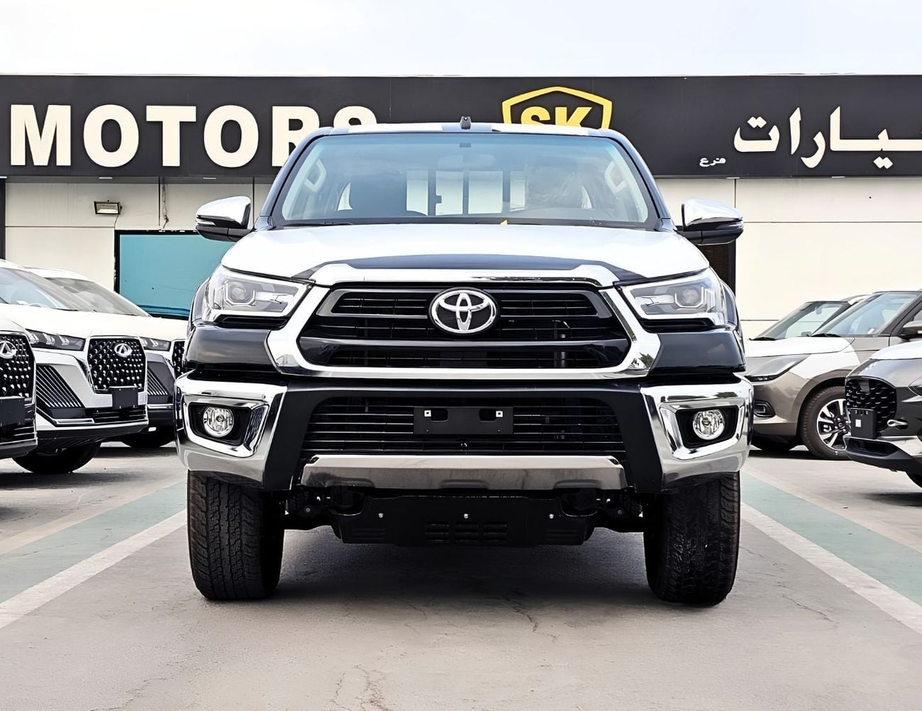 Toyota Hilux TOYOTA HILUX SR5 WIDE BODY DOUBLE CABIN || 2.7L PETROL A/T 4WD | BSM, WINOW VISOR, FOG LIGHTS, WOOD