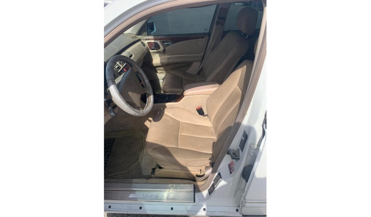 Mercedes-Benz E 320 1998 American model, 6-cylinder kit AMG 55, white inside beige, mileage 198000