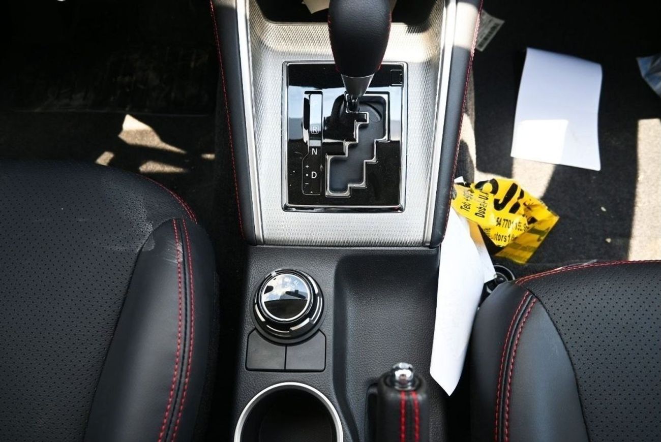 ميتسوبيشي L200 ميتسوبيشي L200 ديزل فل أوبشن أوتوماتيك 2.4 لتر أبيض من الخارج أسود من الداخل