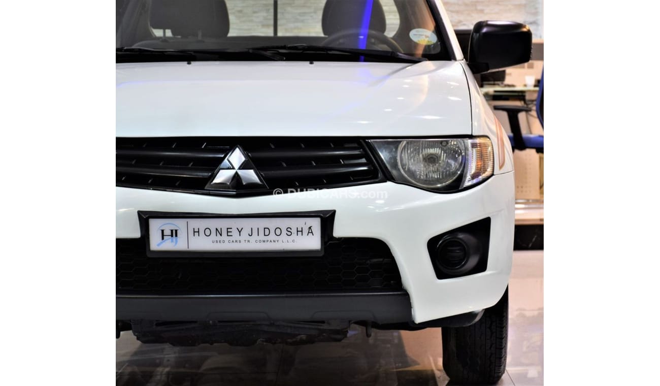 Mitsubishi L200 PERFECT FOR TRANSPORTING ITEMS! Mitsubishi L200 2013 Model!! in White Color! GCC Specs