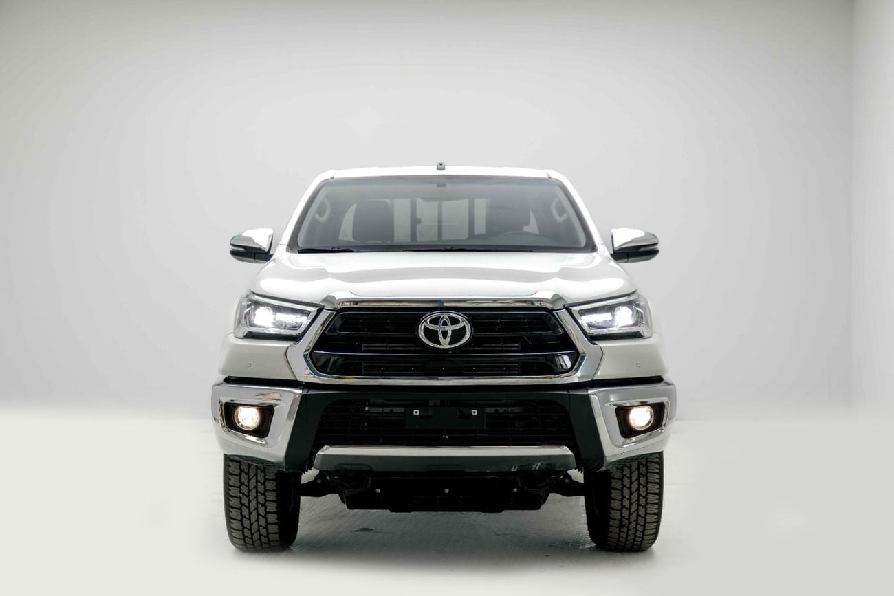 Toyota Hilux 2.4L - Platinum White Inside Maroon | Export Only