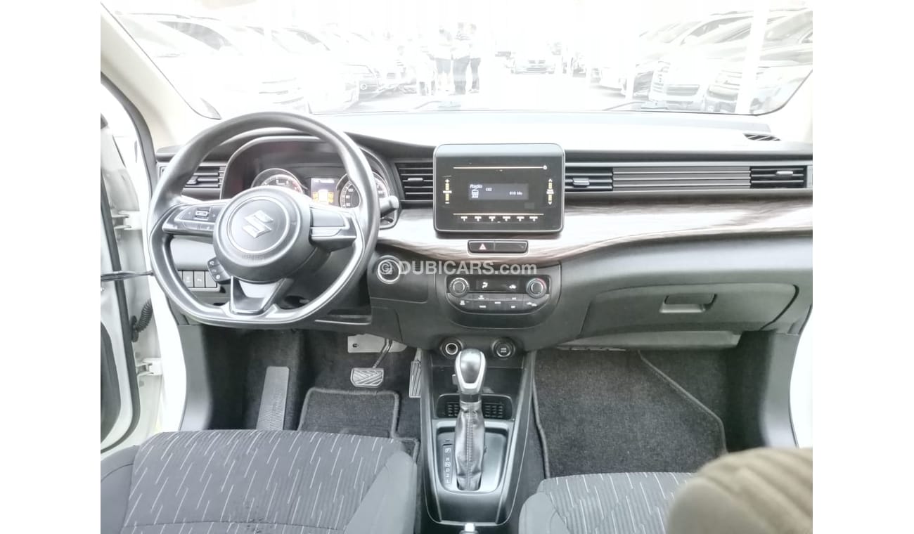 Suzuki Ertiga 2019 model, agency dye, 1600 cc, imprint, white color, rear wing, alloy wheels, air conditioning, wo