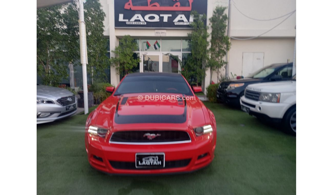 Ford Mustang 2014 GCC model, coupe, cruise control, rear camera, leather rear spoiler, in excellent condition