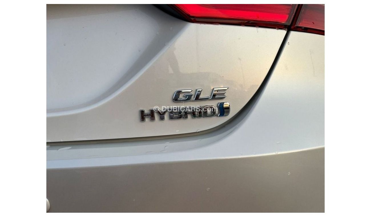 Toyota Camry 2023 GLE (( Hybrid )) White color , 2.5L 4cyl Petrol, A/T, FWD