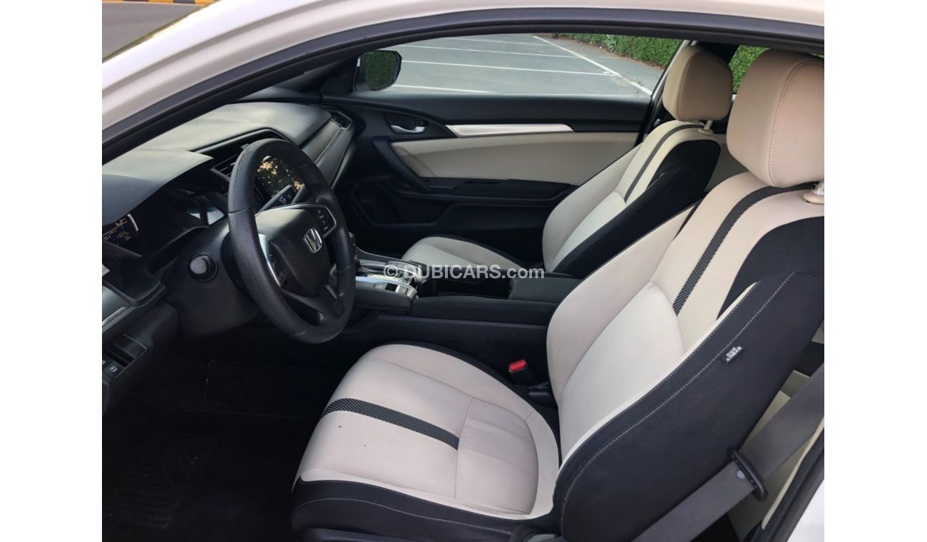 هوندا سيفيك كوبيه موديل 2018 حاله ممتازه جدا من الداخل والخارج كاميرا خلفيه ومدخل اسطوانات وبلوتوث و نفيجشن وراد