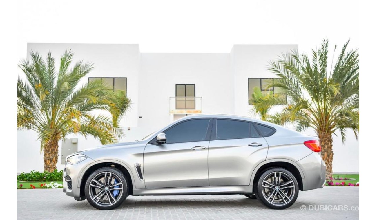 BMW X6M under warranty and service contact