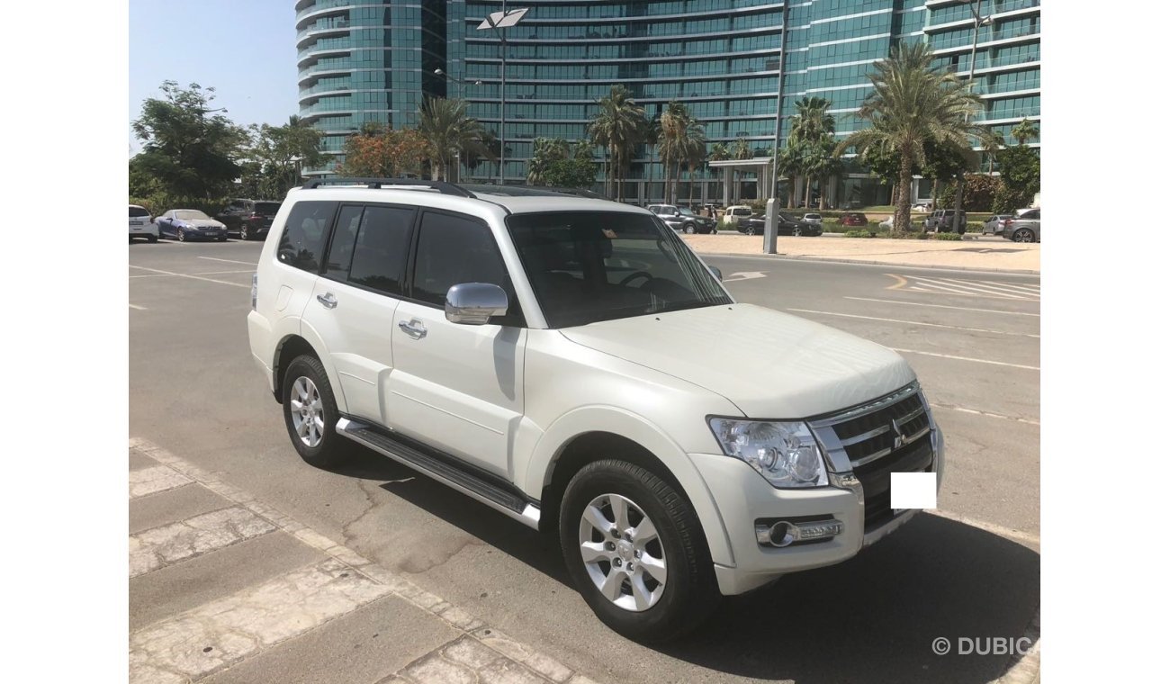 ميتسوبيشي باجيرو GCC EMI 1030X60 , 0% DOWN PAYMENT,MINT CONDITION ,SUNROOF