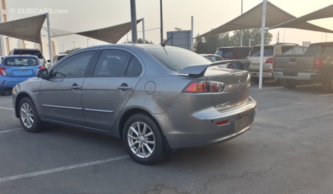 Mitsubishi Lancer السيارة نظيفه جدا بحاله ممتازه بدون حوادث ضمان شاسيه جير ماكينه