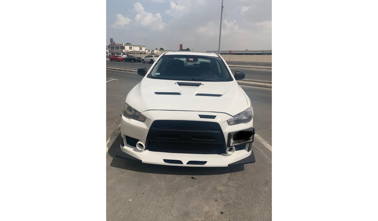 ميتسوبيشي لانسر URGENT! Lancer GT 2010 Modified with Evo kit and BBS rims