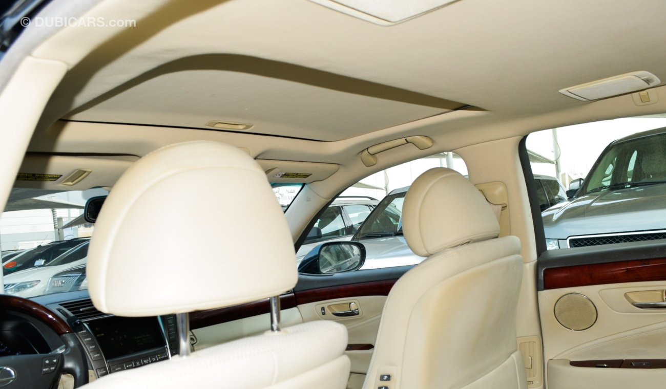 Lexus LS460 Imported 2008 black color inside beige number one leather hatch in excellent condition