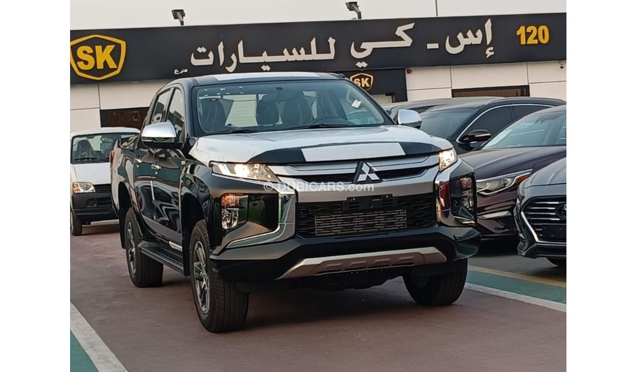 Mitsubishi L200 GLX 2.5L Diesel / M/T / 4WD / Black Rims / Steering Vol Control (Code # L2DDB)