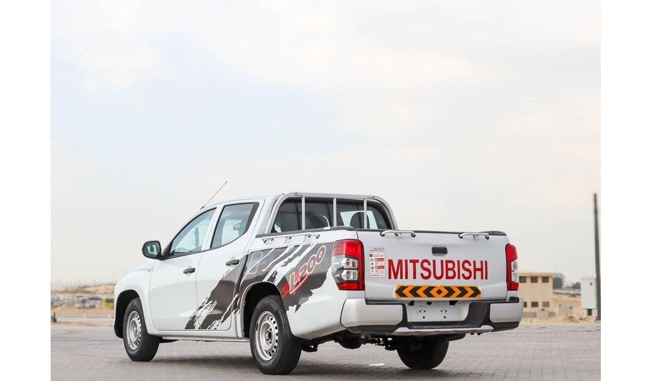 ميتسوبيشي L200 GL 2.4L (128 HP) Double Cab Utility Mitsubishi L200 2.4 L RWD 2020 GCC accident-free in excellent co