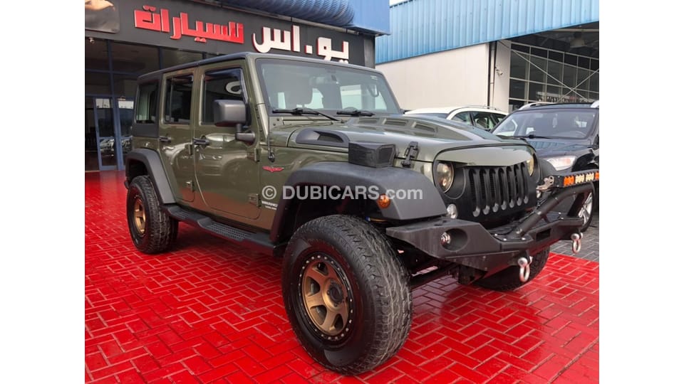 Used Jeep Wrangler UNLIMITED (MILITARY GREEN) GCC 2015 LOW MILEAGE IN