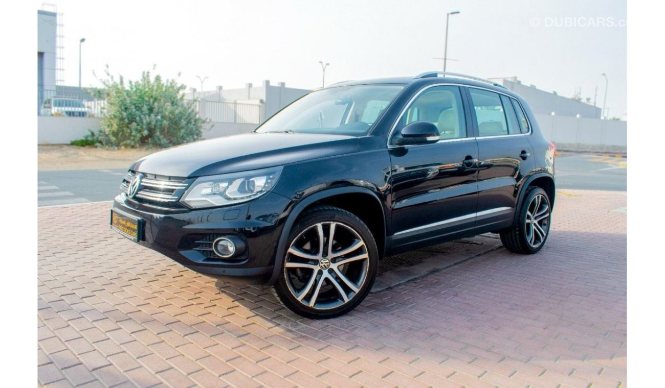 فولكس واجن تيجوان 2015 | VOLKSWAGEN TIGUAN | 2.0L SEL TSI 4 MOTION V4 5-DOORS | AUTOMATIC TRANSMISSION | GCC | VERY WE