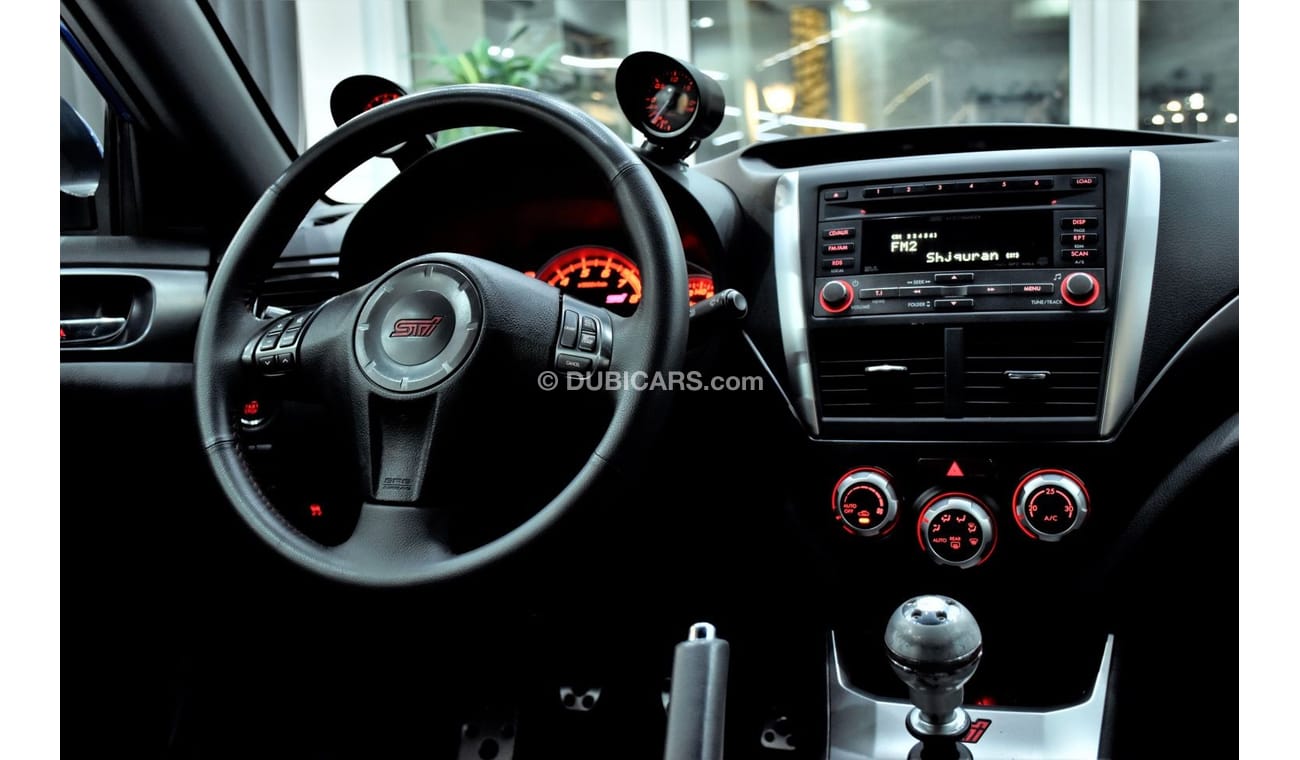 Subaru Impreza WRX EXCELLENT DEAL for our Subaru WRX STi AWD ( 2011 Model ) in Blue Color GCC Specs