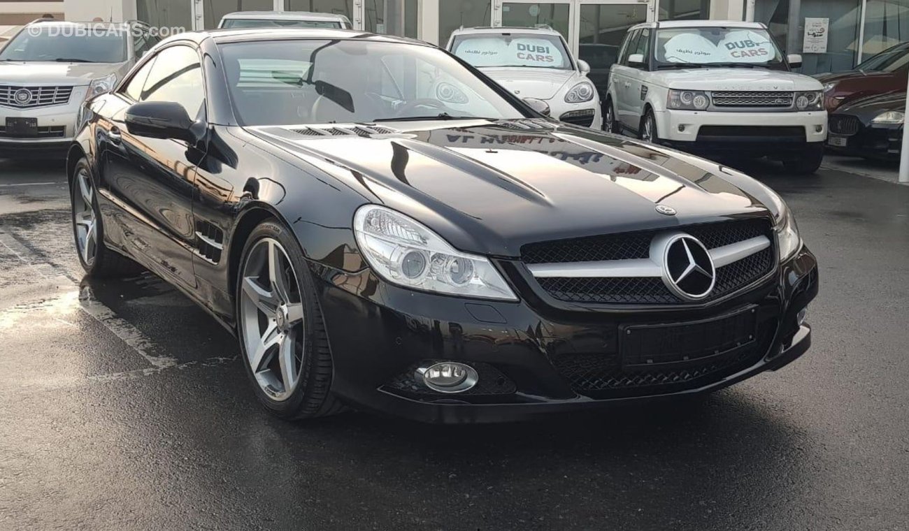 مرسيدس بنز SL 350 موديل 2009 خليجي فل اوبشن شيتري تشيكات وكاله عداد قليل مثبت سرعه وكاميرا خلفيه وكراسي الكترونيه وبلو