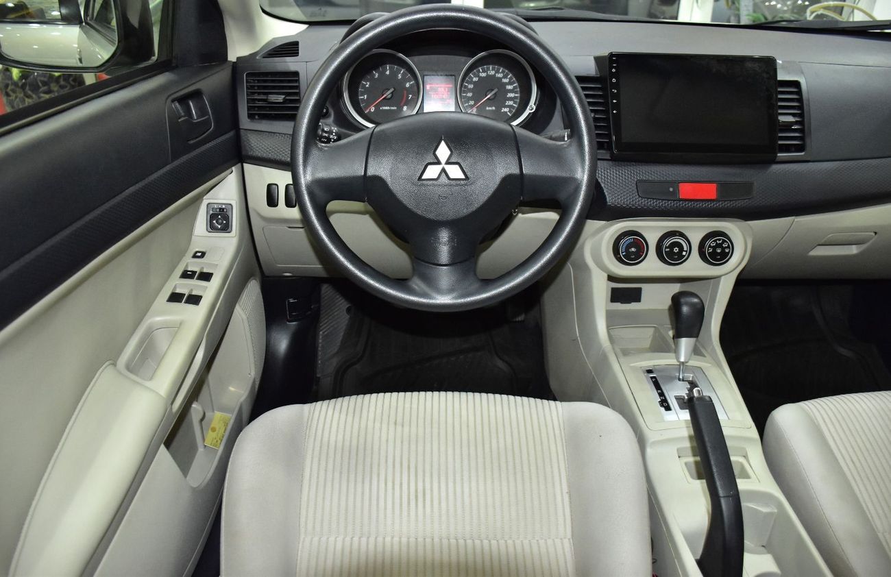 ميتسوبيشي لانسر EX EXCELLENT DEAL for our Mitsubishi Lancer EX ( 2015 Model ) in Beige / Silver Color GCC Specs