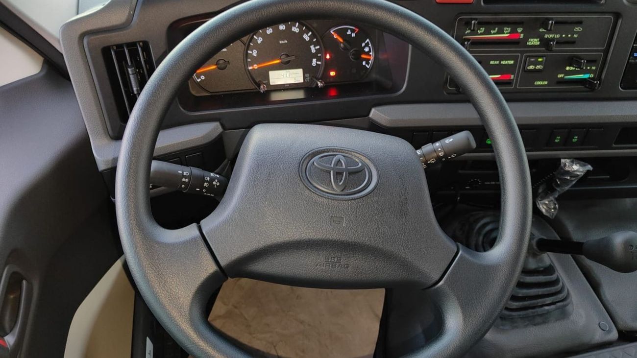 Toyota Coaster 4.0L 23 Seater . Manual . Diesel . 3 Door . Rear Wheel Drive