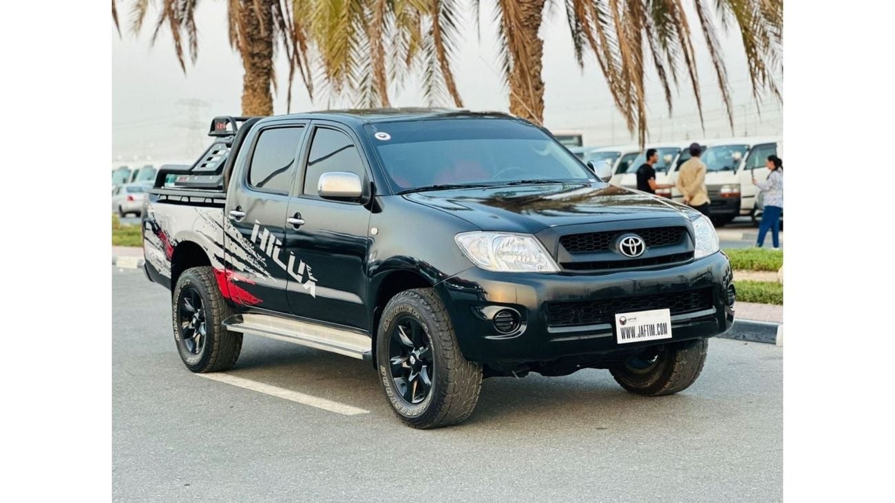 Toyota Hilux DOUBLE CABIN | PREMIUM SPORTS BAR WITH BASKET | 2009 | 2.7L PETROL | LHD | MANUAL | RED INTERIOR
