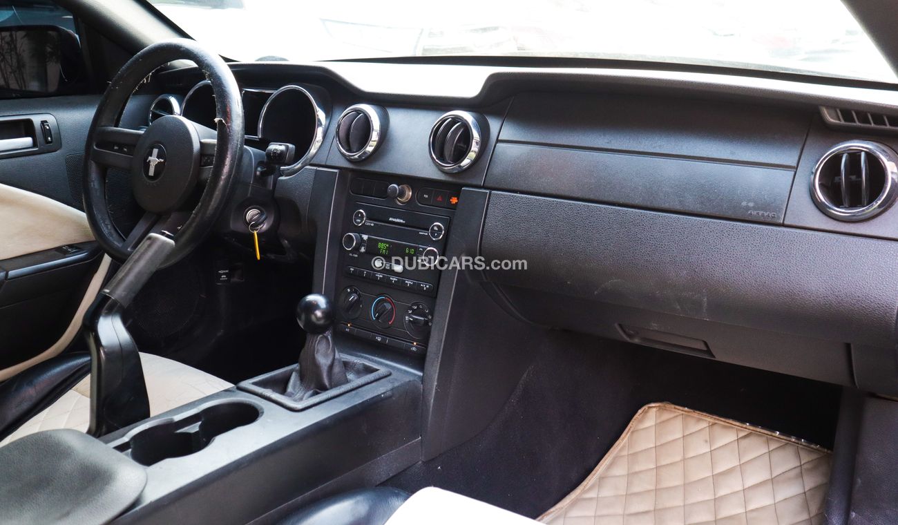 فورد موستانج خليجى كوبيه موديل 2009 لون أسود بحالة ممتازة لاتحتاج لأى مصاريف