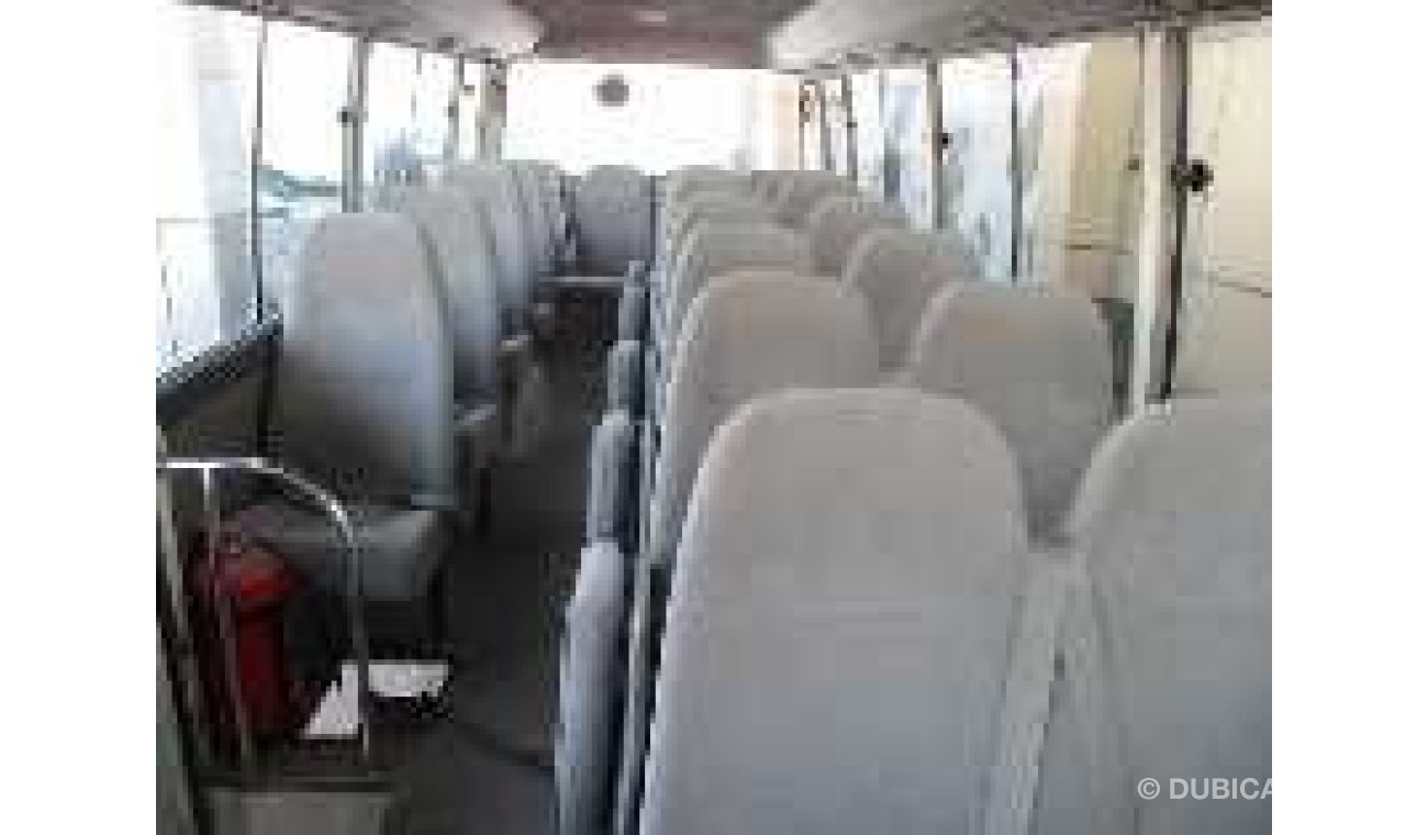 تويوتا كوستر Toyota Coaster 30 seater bus, Model:2013. excellent condition