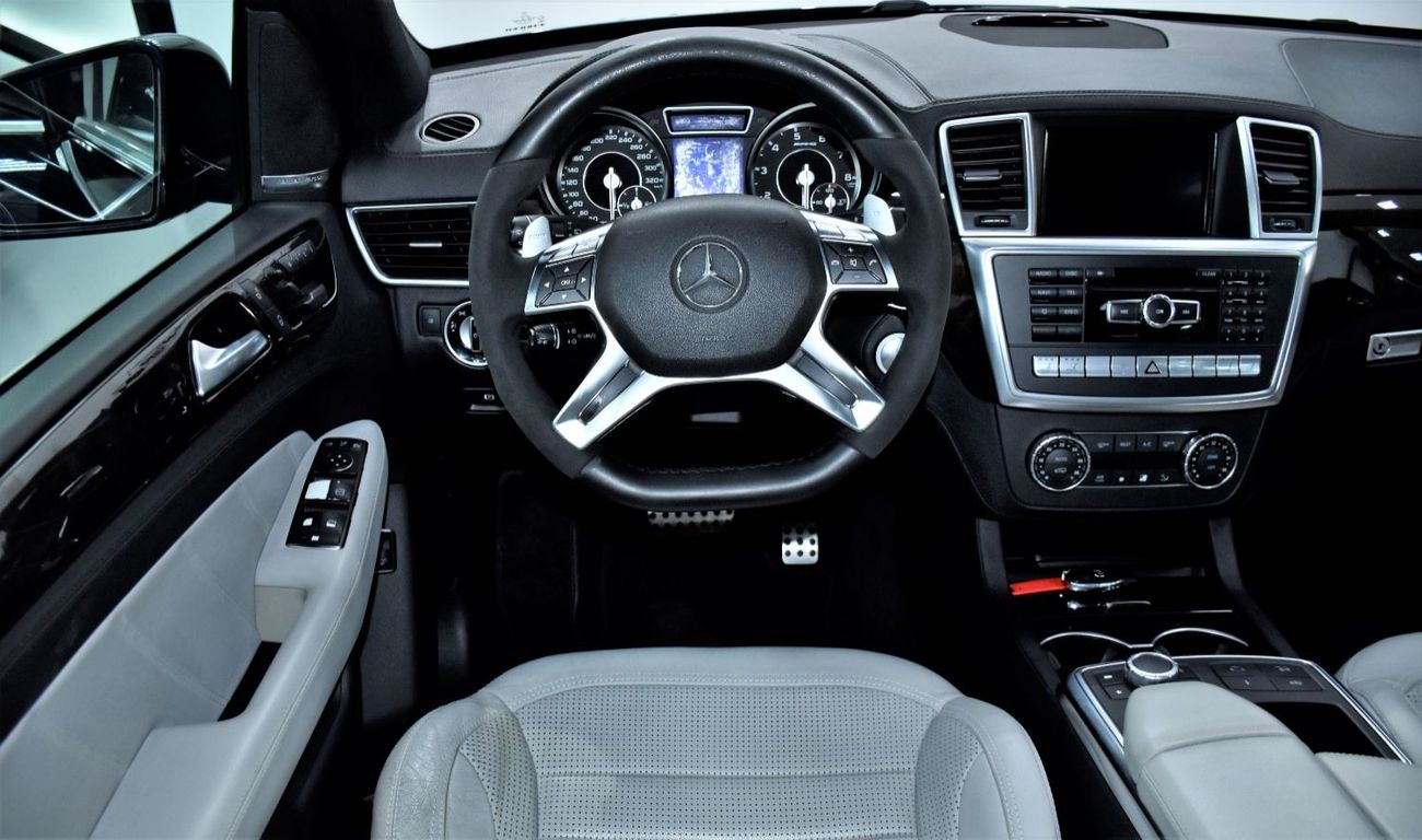 Mercedes-Benz ML 63 AMG EXCELLENT DEAL for our Mercedes Benz ML63 AMG ( 2013 Model ) in Dark Blue Color GCC Specs