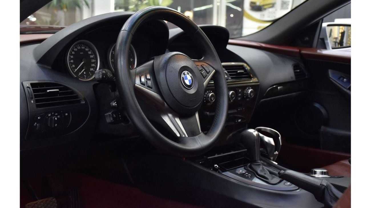 BMW 650i EXCELLENT DEAL for our BMW 650i Convertible ( 2006 Model ) in Silver Color GCC Specs