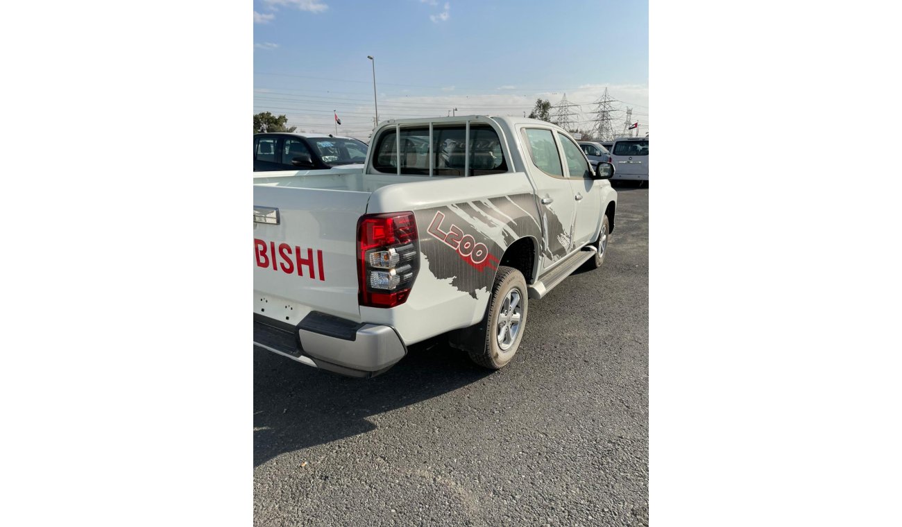 Mitsubishi L200 D/C 2.4 L ENGINE DSL 2020 MODEL 4X4 DOUBLE CABIN DIESEL MANUAL TRANSMISSION BACK ROOF AC