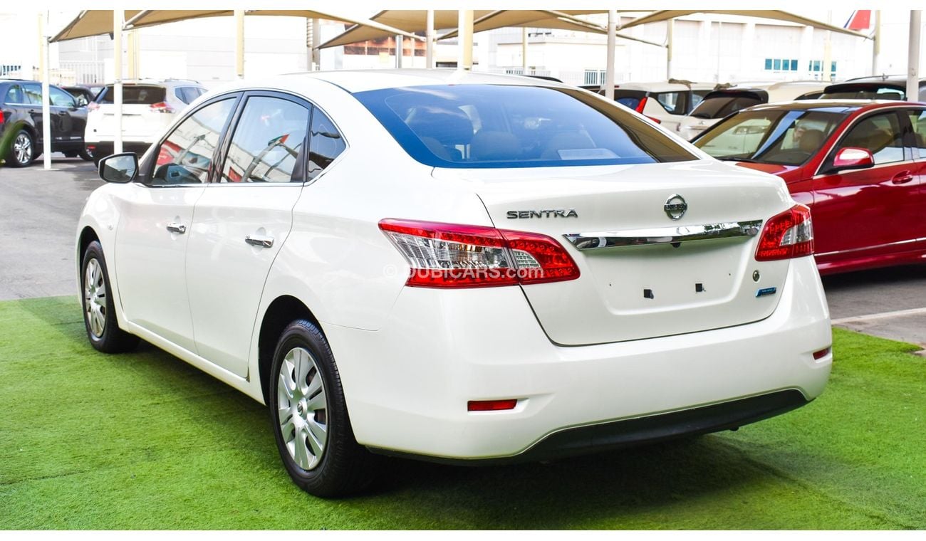 Nissan Sentra GCC, 2016 model, without accidents, white color, beige leather interior, Android screen, rear camera