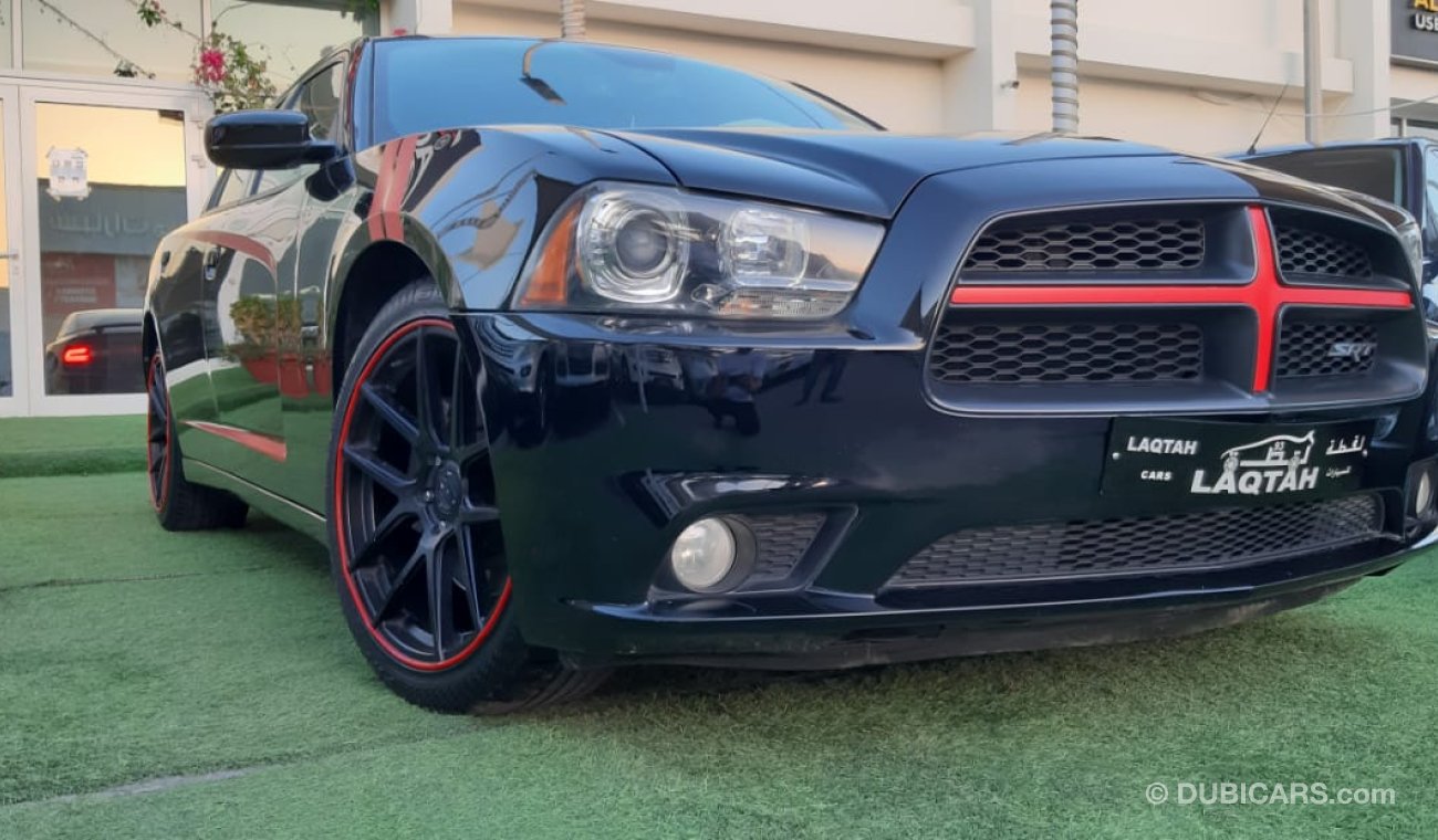 Dodge Charger GCC SRT - No.1 - hatch - leather - wheels - sensors - screen - rear wing in excellent condition,