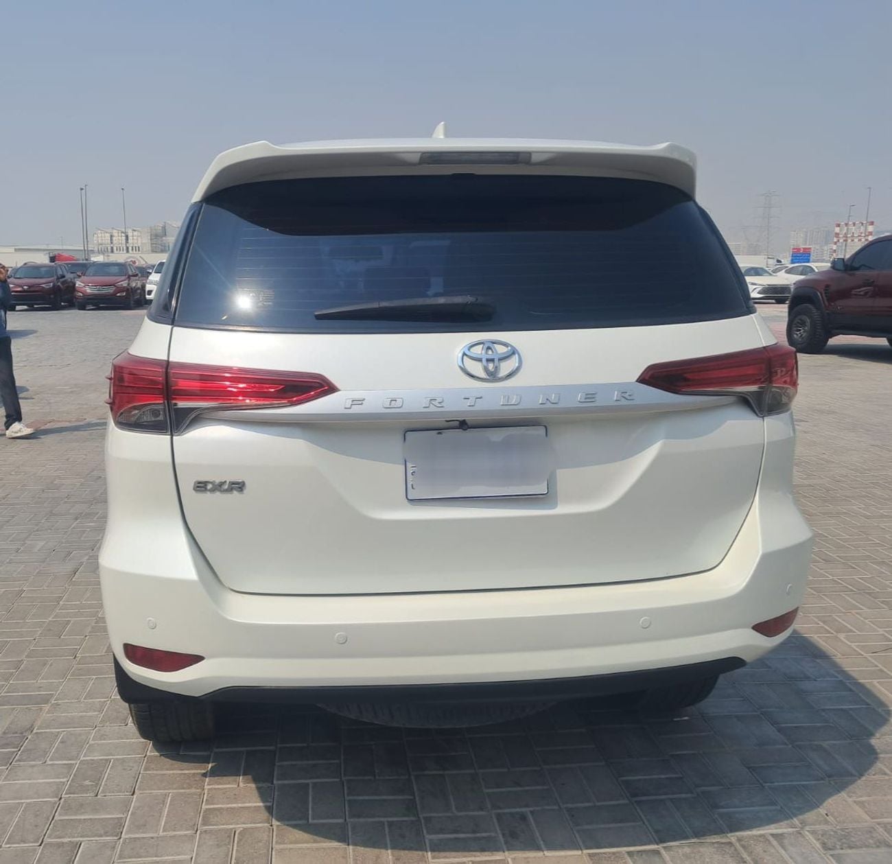 Toyota Fortuner EXR 2.7L v4 petrol Engine Colour White Transmission Automatic  7seats power steering power window contro