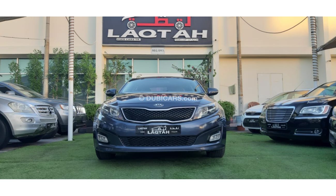 كيا أوبتيما خليجى رقم 2  شاشة   كاميرا  مثبت  سرعة  جناح خلفى رنجات حساسات أنوار ضباب بحالة ممتازة