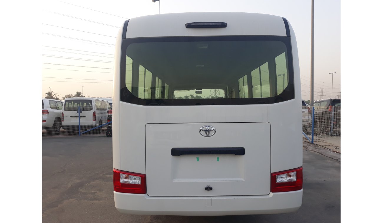 Toyota Coaster DIESEL 4.2L WITH AIR BAGS ABS AND POWER DOOR