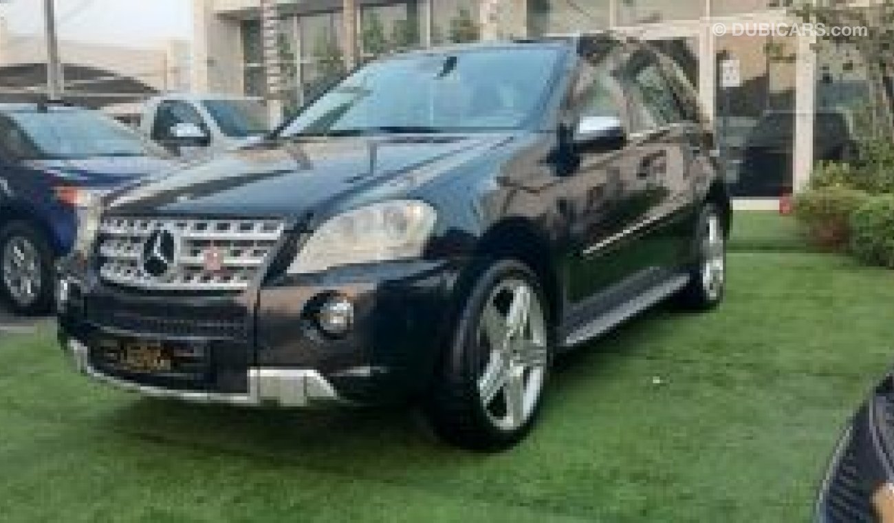 مرسيدس بنز ML 350 خليجى رقم واحد فتحة جلد رنجات حساسات خشب بصمة رنجات حساسات مثبت سرعة تحكم جناح خلفى بحالة ممتازة