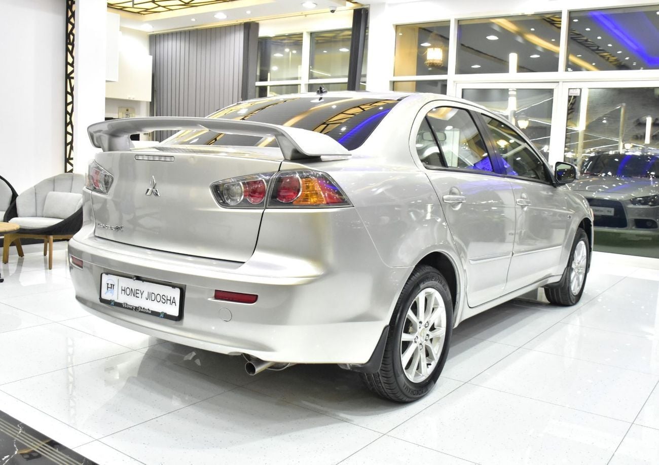 Mitsubishi Lancer EX EXCELLENT DEAL for our Mitsubishi Lancer EX ( 2015 Model ) in Beige / Silver Color GCC Specs