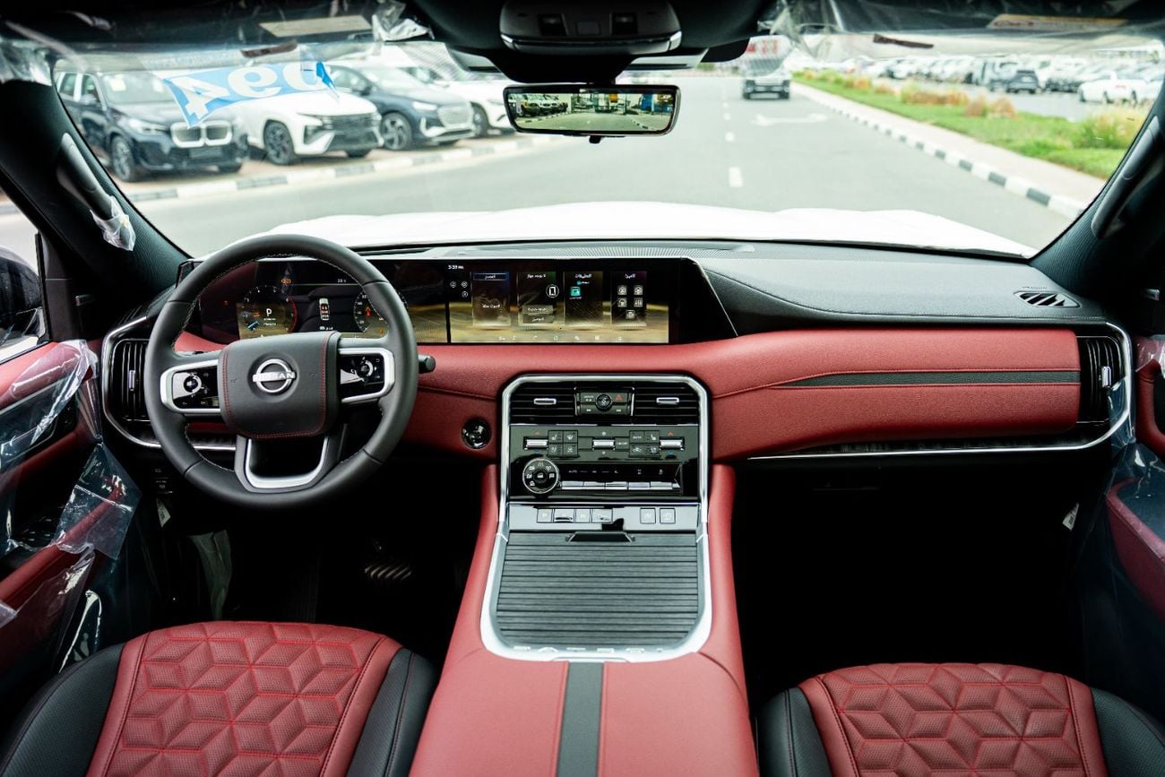 Nissan Patrol Nissan Patrol Platinum 2026 White roof black interior dark red and black