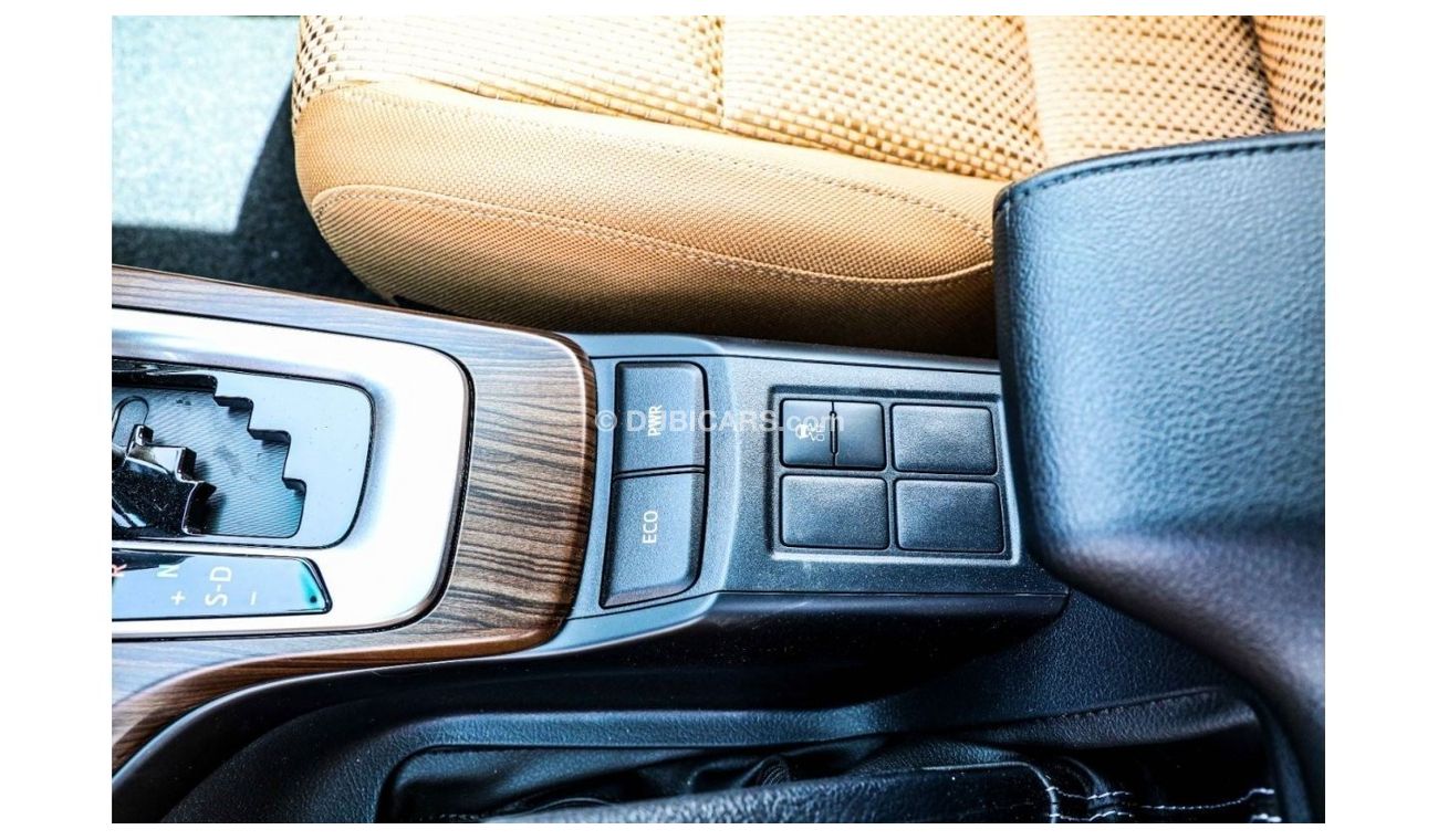 Toyota Fortuner 2023 Toyota Fortuner 2.7 4x2 P AT - Pearl White inside Chamois