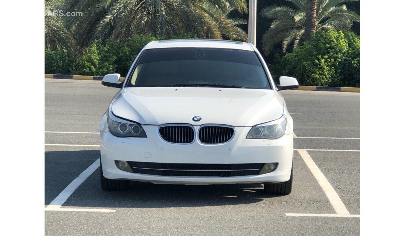 BMW 523i Model 2010 GCC car perfect condition inside and outside full option sun roof leather seats back came