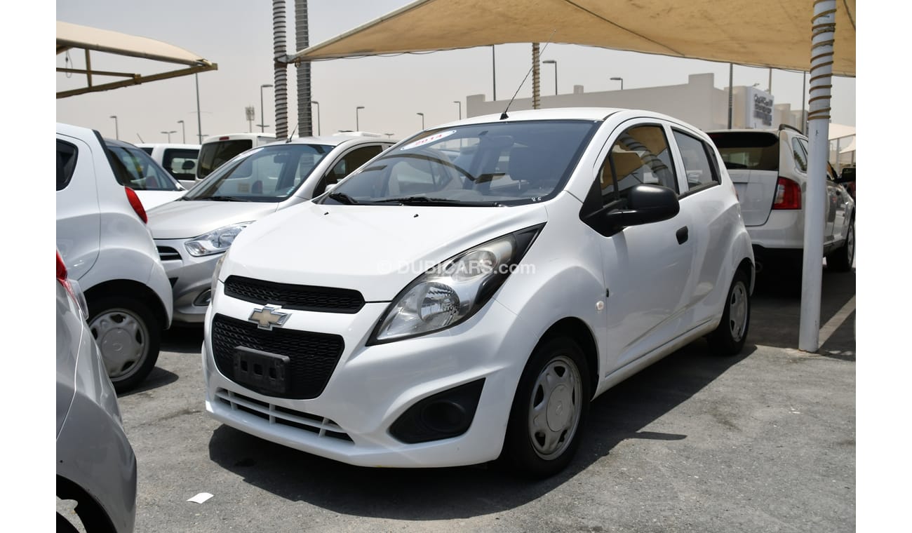 شيفروليه سبارك شيفولية سبارك 2014 ابيض خليجى بدون حوادث بدون صبغ بحالة ممتازة ماشية قليل