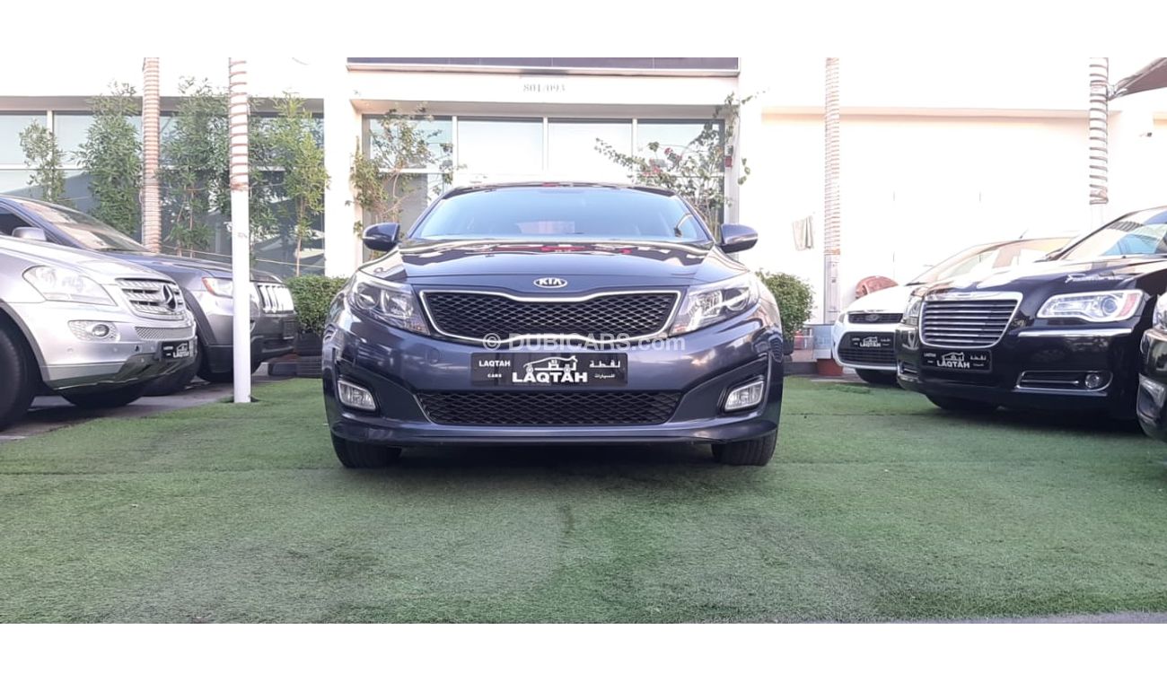 كيا أوبتيما خليجى رقم 2  شاشة   كاميرا  مثبت  سرعة  جناح خلفى رنجات حساسات أنوار ضباب بحالة ممتازة