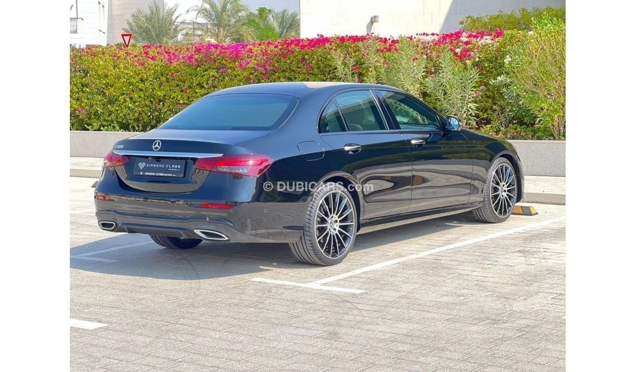 Mercedes-Benz E300 Premium + Mercedes E300 AMG  Panoramic  Head -up Display 2021 GCC  Under Warranty  Full Service Hist