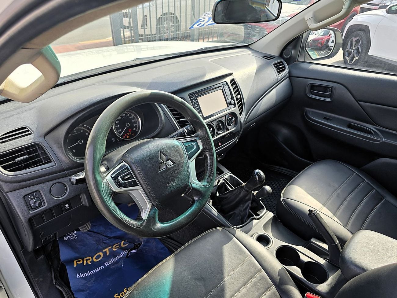 Mitsubishi L200 Used Mitsubishi58 L200 GLX 2.4L Petrol M/T 4*4  GCC White Color  2022 Model