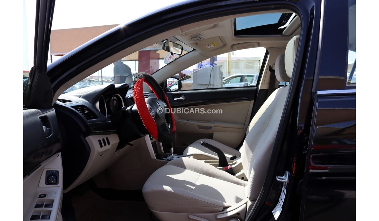 ميتسوبيشي لانسر GLS هاي خالية من الحوادث - خليجي - مكينة 2000 سي سي - رقم واحد - السيارة بحالة ممتازة من الداخل والخ