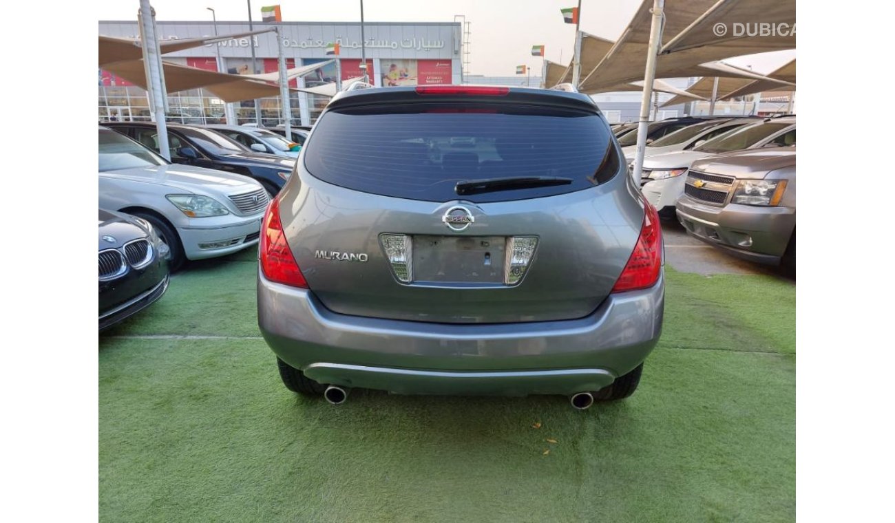 Nissan Murano Model 2008, gray color, number one, leather hatch, wing installer, in excellent condition, you do no
